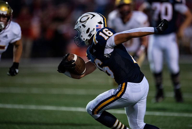 Castle's Carter Bobe (16) runs the ball as the Castle Knights play the Mater Dei Wildcats in Newburgh, Ind., Friday, Aug. 29, 2025.