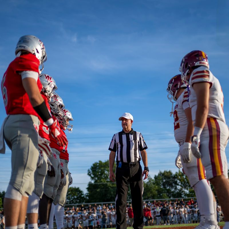 The coin toss prior to the IHSAA football game between the McCutcheon Mavericks at the West Lafayette Red Devils Friday, Aug. 29, 2025, at Gordon Straley Field in West Lafayette, Ind. McCutcheon won 31-6.