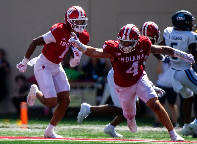 Indiana's Amare Ferrell (1) returns an interception during the Indiana versus Old Dominion football game at Memorial Stadium on Saturday, Aug. 30, 2025.