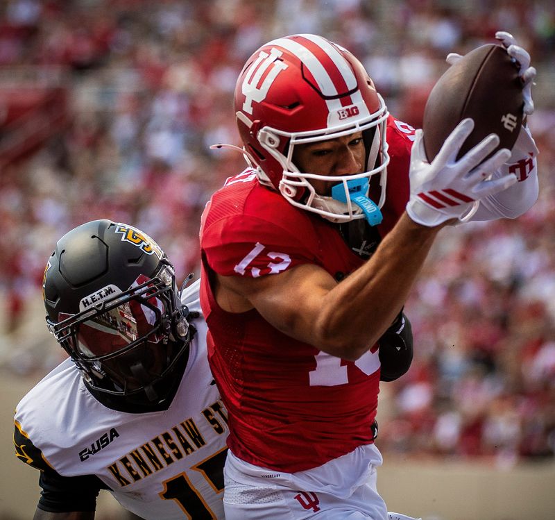 Indiana's Elijah Sarratt (13) makes the catch for a touchdown during the Indiana versus Kennesaw State Big Ten football game at Memorial Stadium on Saturday, Sept. 6, 2025.