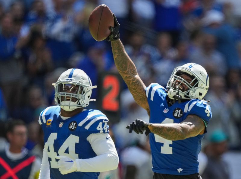 Indianapolis Colts cornerback Xavien Howard (4) celebrates a fumble and a turnover Sunday, Sept. 7, 2025, during the game at Lucas Oil Stadium in Indianapolis.