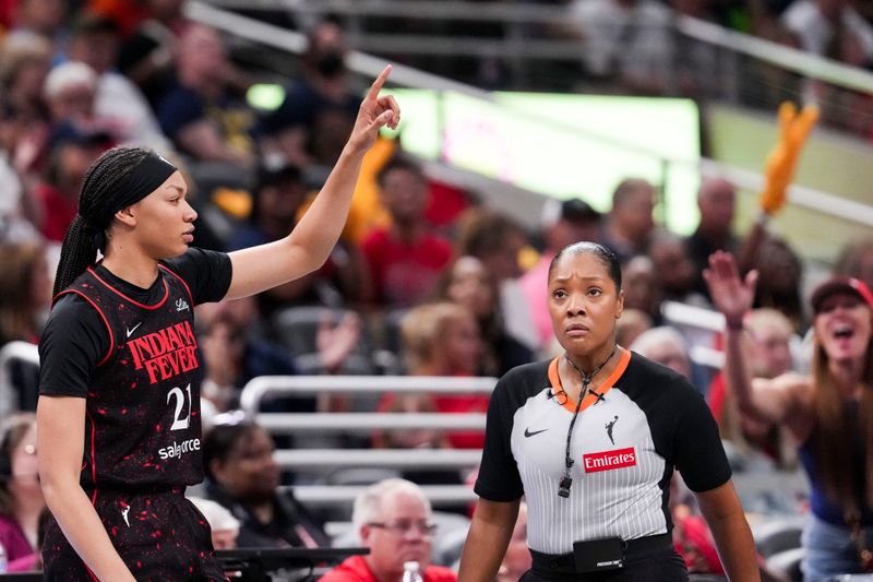Indiana Fever forward Makayla Timpson (21) checks into the game Tuesday, Sept. 9, 2025, during a game between the Indiana Fever and the Minnesota Lynx at Gainbridge Fieldhouse in Indianapolis. The Indiana Fever defeated the Minnesota Lynx, 83-72.