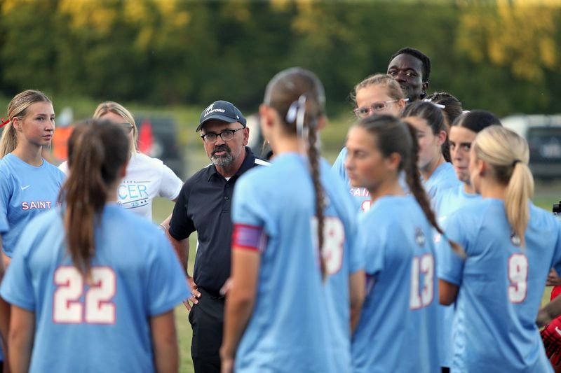 Saint Joseph coach Phil DePauw talks to his team before a girls soccer match against Mishawaka Marian Wednesday, Sept. 10, 2025, at the Northfield Sports Complex in South Bend.