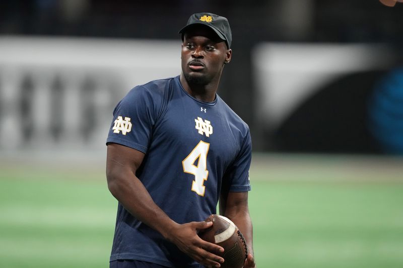 Jan 18, 2025; Atlanta, GA, USA; Notre Dame Fighting Irish running back Jeremiyah Love (4) during practice at Mercedes-Benz Stadium. Mandatory Credit: Kirby Lee-Imagn Images