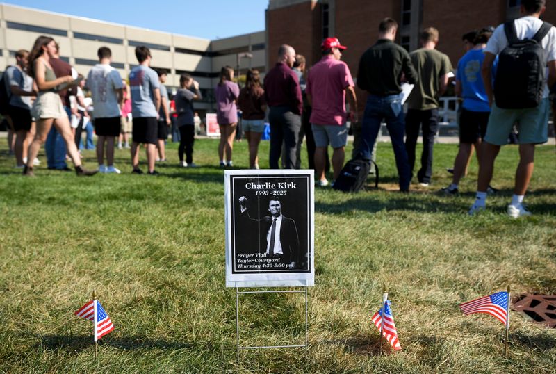 Students and community members gather at a vigil in honor of conservative activist Charlie Kirk on Thursday, Sept. 11, 2025, at Indiana University Indianapolis. The event, organized by the university’s chapter of Turning Point USA, featured speakers, singing and prayer. Kirk was killed Sept. 10 while speaking at Utah Valley University.