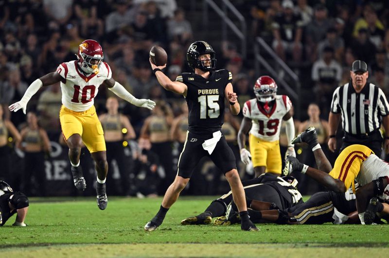 Purdue quarterback Ryan Browne throws a pass before getting the ball back to run in for a touchdown during the second half against USC on Saturday, Sept. 13, 2025 at Ross-Ade Stadium.