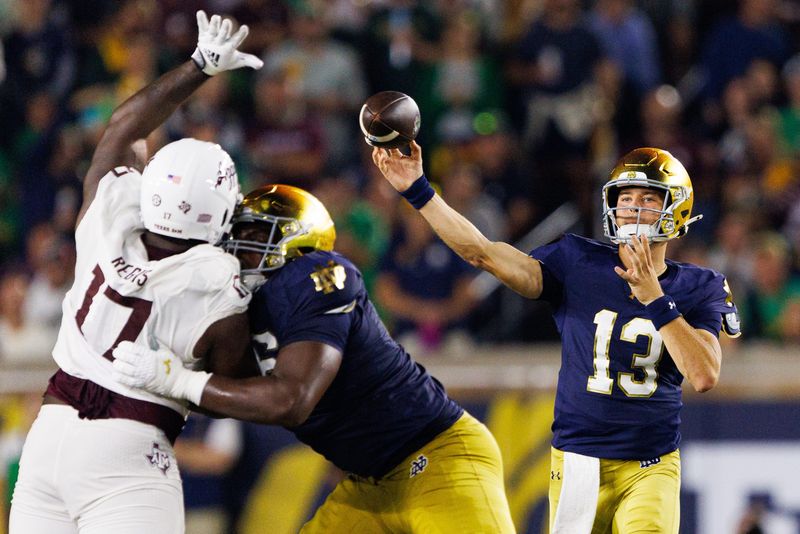 Notre Dame quarterback CJ Carr (13) throws the ball in the first half of a NCAA football game against Texas A&M at Notre Dame Stadium on Saturday, Sept. 13, 2025, in South Bend.