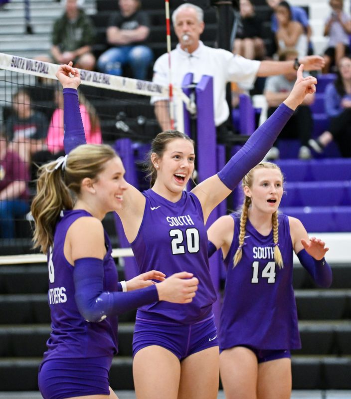 Bloomington South’s Quinn Reynolds (20) celebrates after winning a point during the Bloomington South-Bloomington North volleyball match at South on Tuesday, Sept. 16, 2025.