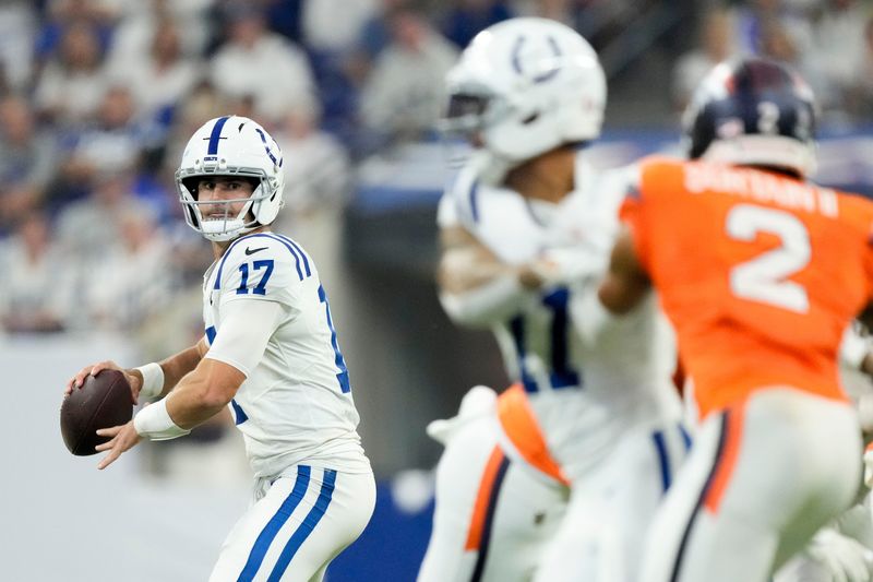 Indianapolis Colts quarterback Daniel Jones (17) looks to pass downfield Sunday, Sept. 14, 2025, during a game against the Denver Broncos at Lucas Oil Stadium in Indianapolis.