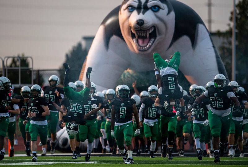 The North Huskies take the field ahead of their game against the Bosse Bulldogs at North High School in Evansville, Ind., Friday, Sept. 19, 2025.