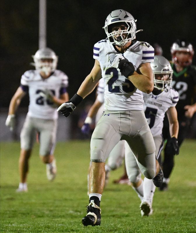 Bloomington South’s Ross Ogden (23) celebrates after a play during the football game at Terre Haute South on Friday, Sept. 19, 2025.