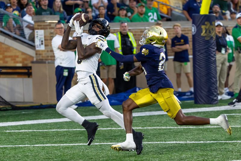 Purdue Boilermakers wide receiver Nitro Tuggle makes a catch for a touchdown as Notre Dame cornerback Mark Zackery IV defends Saturday, Sept. 20, 2025 at Notre Dame Stadium.