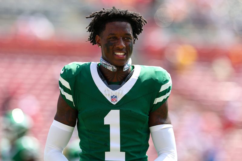 Sep 21, 2025; Tampa, Florida, USA; New York Jets cornerback Sauce Gardner (1) warms up before a game against the Tampa Bay Buccaneers at Raymond James Stadium. Mandatory Credit: Nathan Ray Seebeck-Imagn Images