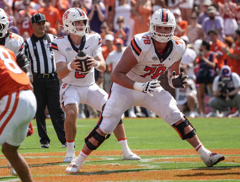 Sep 20, 2025; Clemson, South Carolina, USA; Syracuse Orange quarterback Steve Angeli (9) takes a snap near offensive lineman Joe Cruz (78) playing the Clemson Tigers during the first quarter at Memorial Stadium. Mandatory Credit: Ken Ruinard/GREENVILLE NEWS-USA TODAY Network via Imagn Images