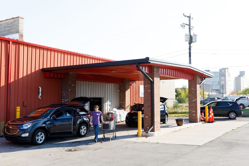Cars line up to receive food at Food Bank of Northern Indiana on Friday, Sept. 19, 2025, in South Bend.