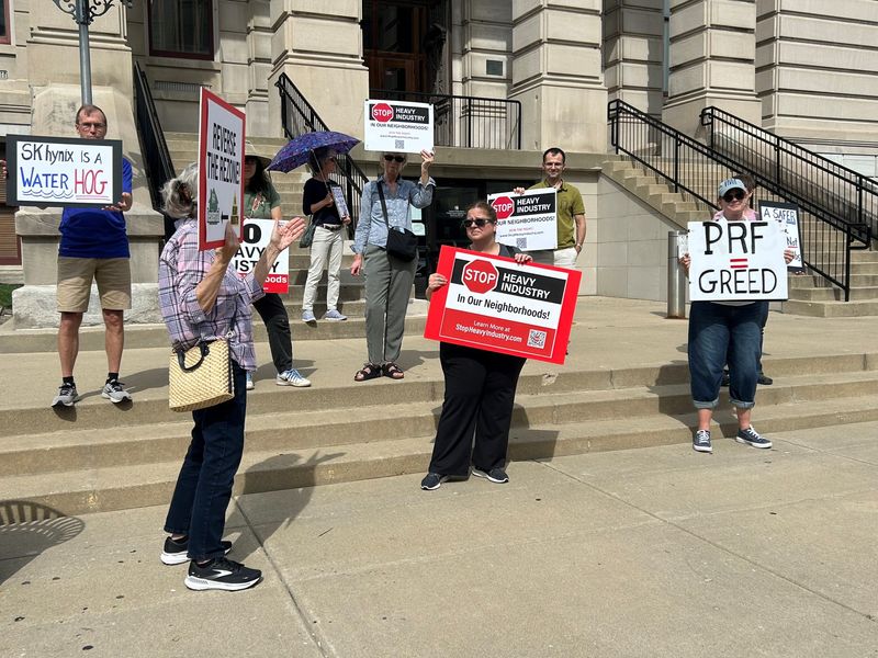Opponents of SK hynix planned microchip factory at the northwest corner of Salisbury Street and Kalberer Road protest Tuesday, Sept. 23, 2025, outside the Tippecanoe County Courthouse before a hearing to address issues in two civil cases.