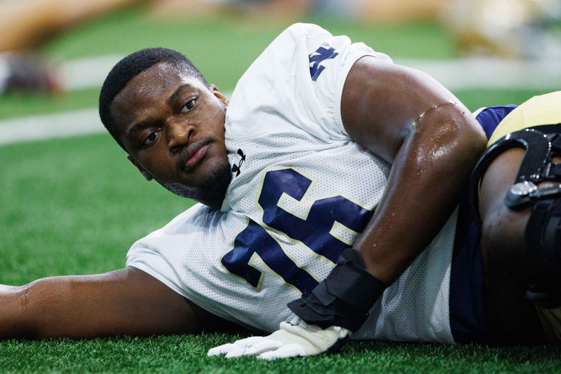Notre Dame offensive lineman Guerby Lambert warms up during a Notre Dame football practice at Irish Athletic Center on Thursday, Aug. 15, 2024, in South Bend.