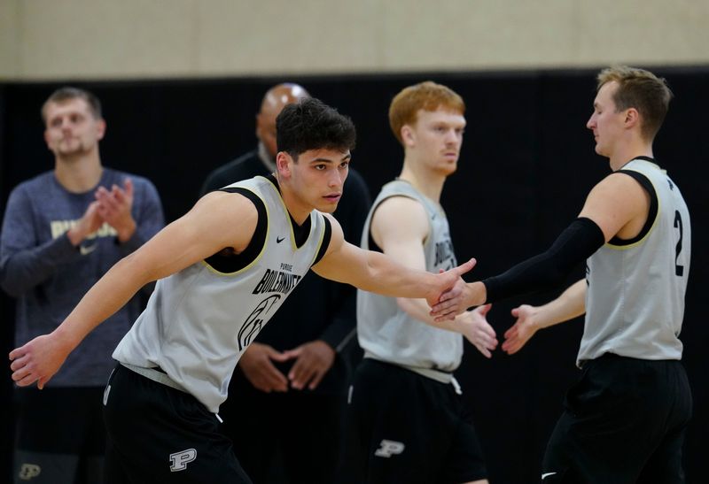 Purdue Boilermakers guard Omer Mayer (17) gets a high five from guard Fletcher Loyer (2) during practice Wednesday, Sept. 24, 2025, at Mackey Arena in West Lafayette.