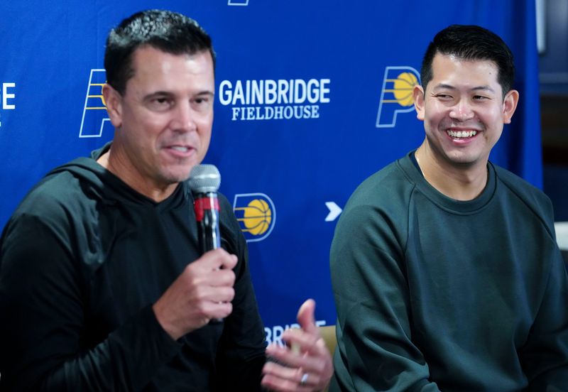 Chad Buchanan, Indiana Pacers general manager, (left) and Ted Wu, Indiana's vice president of basketball operations and cap management, speak to media members Thursday, Sept. 25, 2025, at Gainbridge Fieldhouse in Indianapolis.