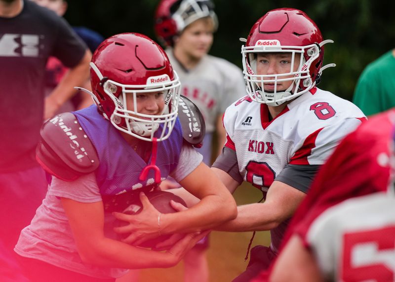 Knox's Myles McLaughlin hands off the ball Tuesday, Sept. 23, 2025, during practice at Knox High School in Knox.