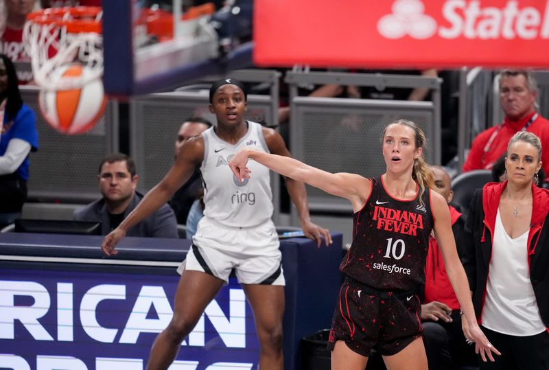 Indiana Fever guard Lexie Hull (10) watches her three-point basket go through the net Friday, Sept. 26, 2025, during Game 3 of the WNBA semifinals against the Las Vegas Aces at Gainbridge Fieldhouse in Indianapolis.