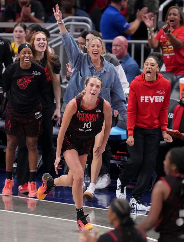 Indiana Fever guard Lexie Hull (10) reacts after scoring a three-point basket Friday, Sept. 26, 2025, during Game 3 of the WNBA semifinals against the Las Vegas Aces at Gainbridge Fieldhouse in Indianapolis.
