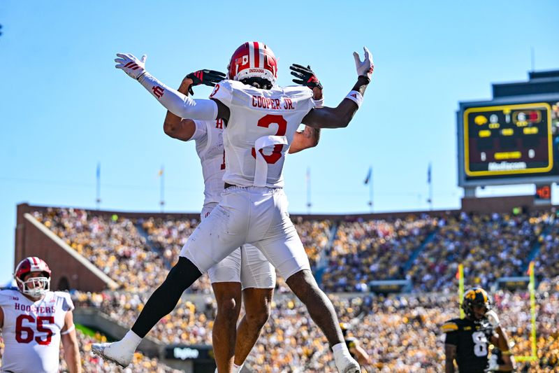 Sep 27, 2025; Iowa City, Iowa, USA; Indiana Hoosiers wide receiver Omar Cooper Jr. (3) reacts with teammates after a touchdown reception against the Iowa Hawkeyes during the first quarter at Kinnick Stadium. Mandatory Credit: Jeffrey Becker-Imagn Images