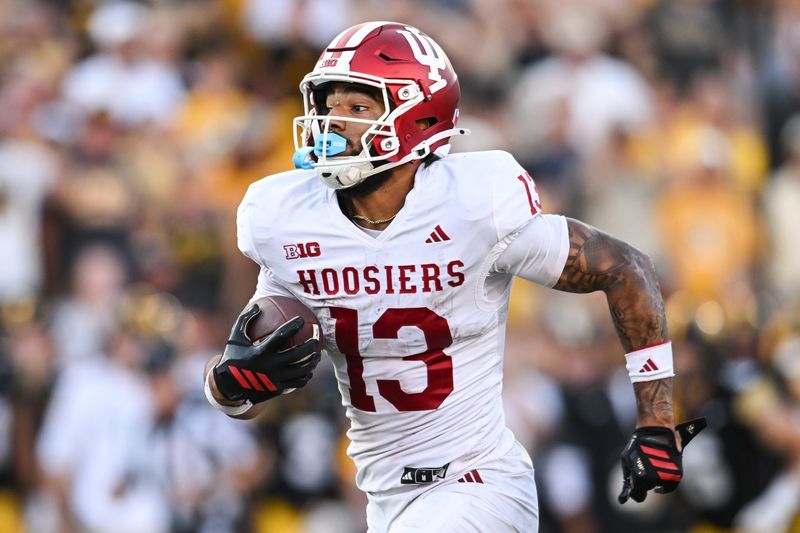 Indiana wide receiver Elijah Sarratt runs for the end zone on a 49-yard touchdown reception late during the fourth quarter against the Iowa Hawkeyes on Saturday, Sept. 27, 2025 at Kinnick Stadium in Iowa City, Iowa.