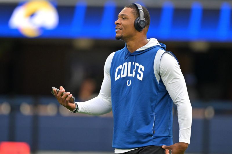 Sep 28, 2025; Inglewood, California, USA; Indianapolis Colts quarterback Anthony Richardson (5) warms up prior to the game against the Los Angeles Rams at SoFi Stadium. Mandatory Credit: Jayne Kamin-Oncea-Imagn Images