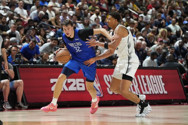 Jul 12, 2025; Las Vegas, NV, USA; Dallas Mavericks forward Cooper Flagg (32) drives past San Antonio Spurs forward Carter Bryant (11) in the fourth quarter of their game at Thomas & Mack Center. Mandatory Credit: Candice Ward-Imagn Images