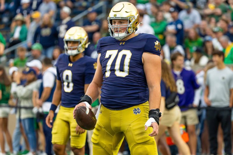 Sep 13, 2025; South Bend, Indiana, USA; Notre Dame Fighting Irish offensive lineman Ashton Craig (70) during warmups before a game against the Texas A&M Aggies at Notre Dame Stadium. Mandatory Credit: Michael Caterina-Imagn Images