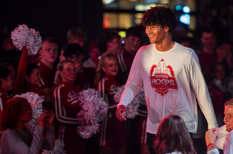 Indiana's Josh Harris is introduced during the Hoosier Hoops on Kirkwood event on Kirkwood Avenue just outside the Sample Gates on Thursday, Oct. 2, 2025.