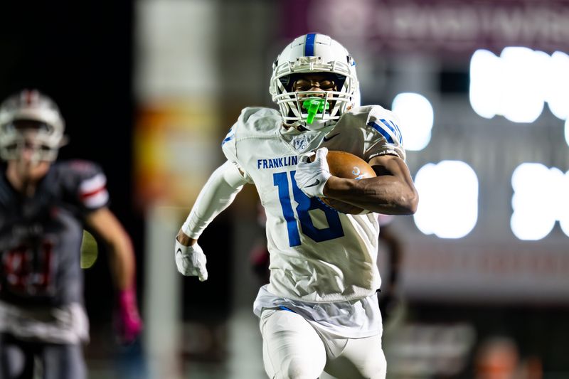 Franklin Central High School sophomore Markell Bailey (18) runs the ball toward the end zone to score during the first half of an IHSAA varsity football game against Fishers High School, Friday, Oct. 3, 2025, at Fishers High School.