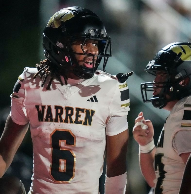 Warren Central Zechariah Wallace (6) celebrates Friday, Oct. 3, 2025, during a game between the Lawrence North Wildcats and Warren Central at Lawrence North High School in Indianapolis.