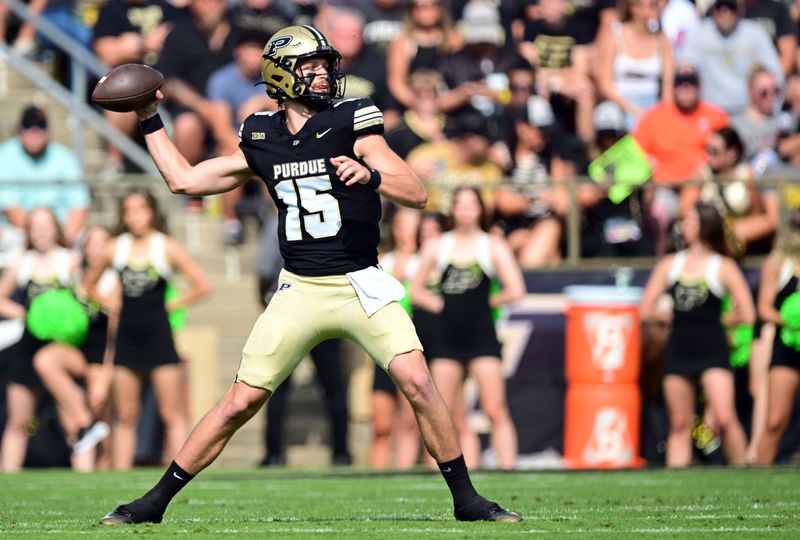 Purdue quarterback Ryan Browne throws a pass against the Fighting Illini on Saturday, Oct. 4, 2025, at Ross-Ade Stadium in West Lafayette.