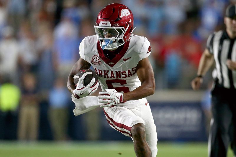 Sep 13, 2025; Oxford, Mississippi, USA; Arkansas Razorback wide receiver Raylen Sharpe (6) runs after a catch during the fourth quarter against the Mississippi Rebels at Vaught-Hemingway Stadium. Mandatory Credit: Petre Thomas-Imagn Images