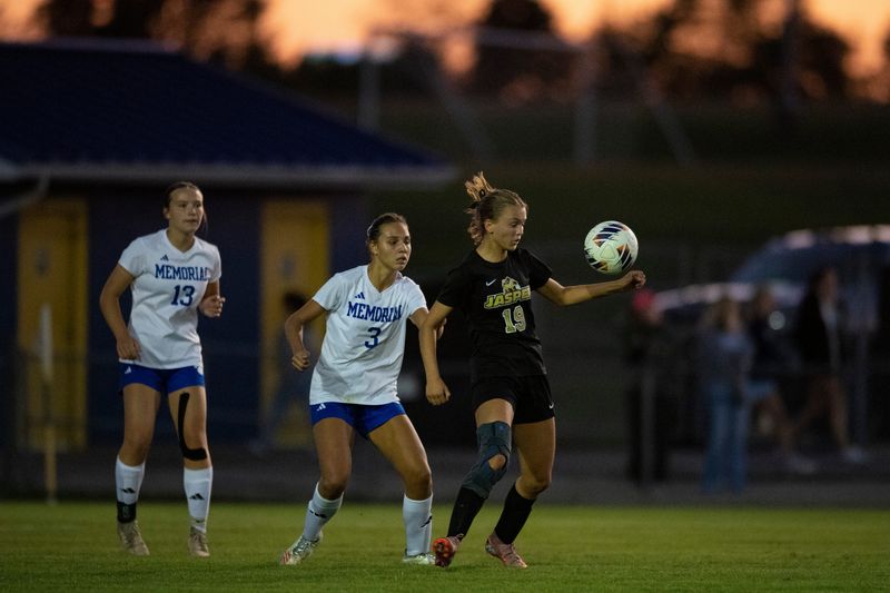 Jasper's Arden Brames (19) stops the ball as the Memorial Lady Tigers play the Jasper Lady Wildcats in the 2025 IHSAA Class 3A Girls Soccer sectional semifinal at Castle High School in Newburgh, Ind., Thursday, Oct. 9, 2025.
