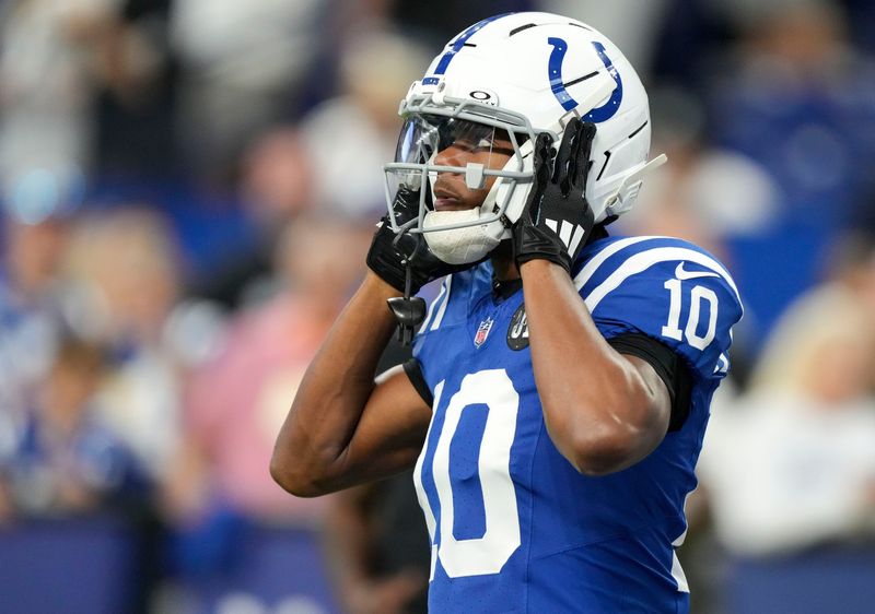 Indianapolis Colts wide receiver Adonai Mitchell (10) warms up Sunday, Oct. 5, 2025, before a game against the Las Vegas Raiders at Lucas Oil Stadium in Indianapolis.