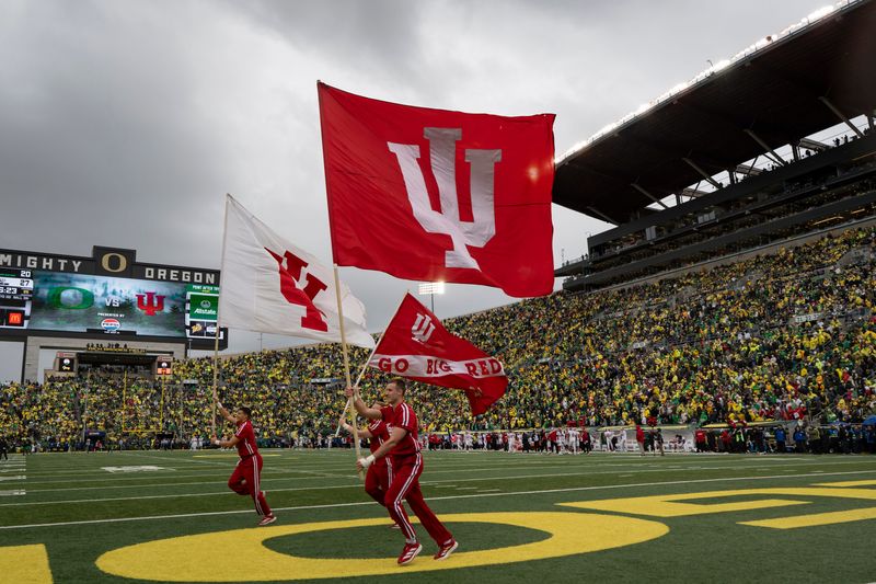 Indiana cheerleaders celebrate a touchdown as the Oregon Ducks host the Indiana Hoosiers Oct. 11, 2025, at Autzen Stadium in Eugene, Oregon.
