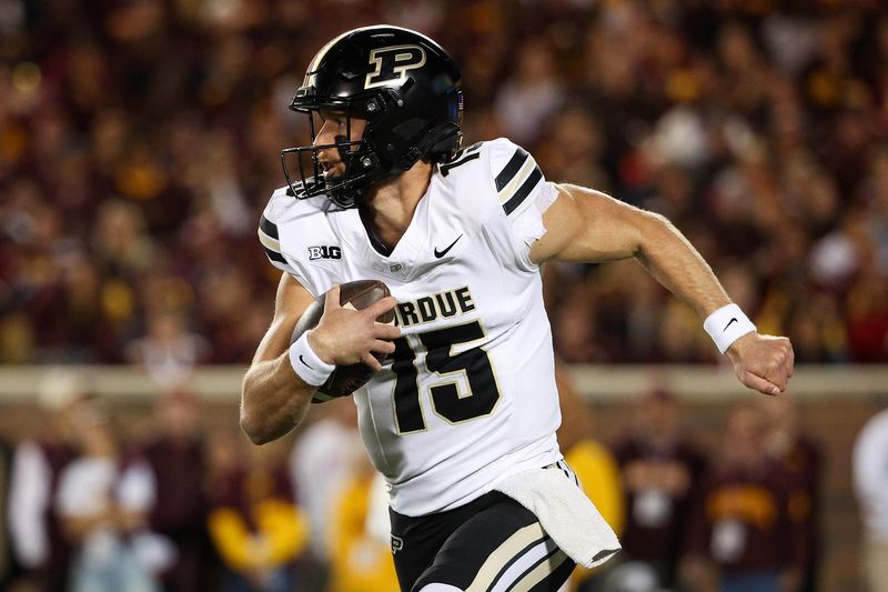 Purdue Boilermakers quarterback Ryan Browne runs the ball against the Minnesota Golden Gophers on Saturday, Oct. 11, 2025, at Huntington Bank Stadium in Minneapolis.