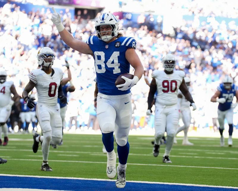 Indianapolis Colts tight end Tyler Warren (84) scores a touchdown during a game against the Arizona Cardinals on Sunday, Oct. 12, 2025, at Lucas Oil Stadium in Indianapolis