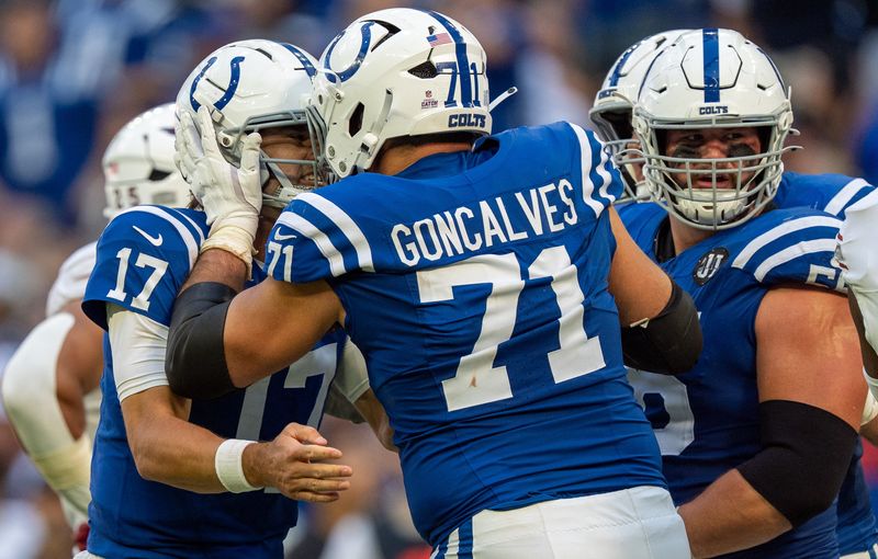 Indianapolis Colts offensive tackle Matt Goncalves (71) celebrates a touchdown pass with quarterback Daniel Jones (17) on Sunday, Oct. 12, 2025, against the Arizona Cardinals at Lucas Oil Stadium in Indianapolis.