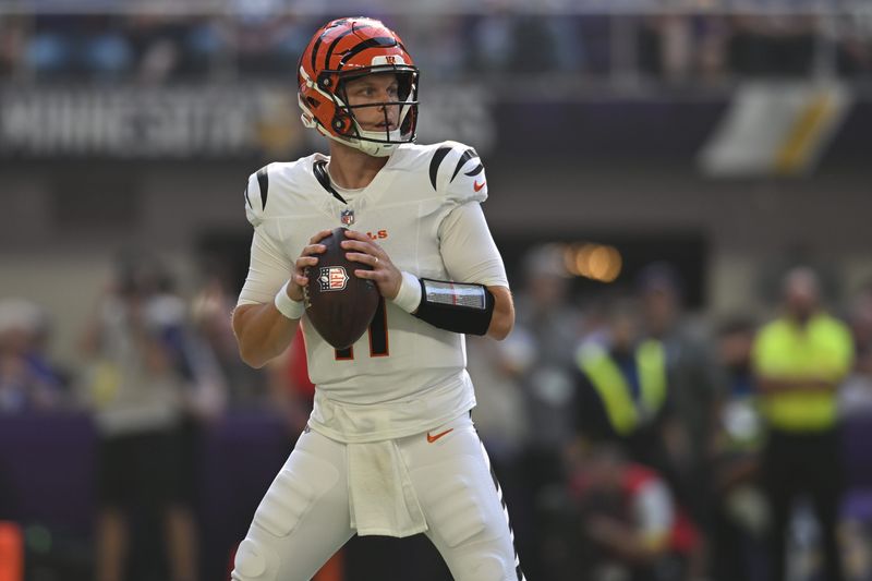 Sep 21, 2025; Minneapolis, Minnesota, USA; Cincinnati Bengals quarterback Brett Rypien (11) stands in the pocket against the Minnesota Vikings during the second half at U.S. Bank Stadium. Mandatory Credit: Jeffrey Becker-Imagn Images
