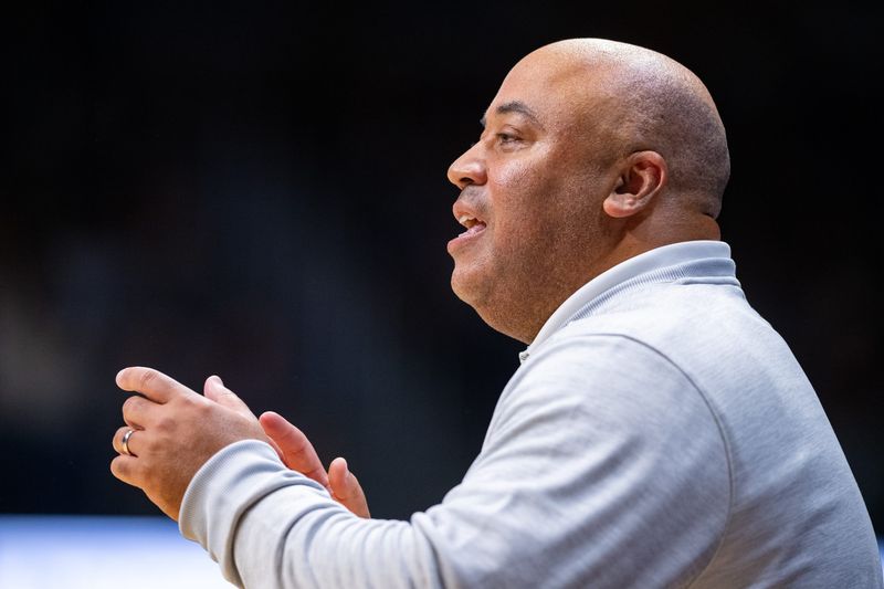 Notre Dame Fighting Irish head coach Micah Shrewsberry reacts to play on the court during the first half of an NCAA basketball game against the Butler Bulldogs, Friday, Oct. 17, 2025, at Hinkle Fieldhouse.