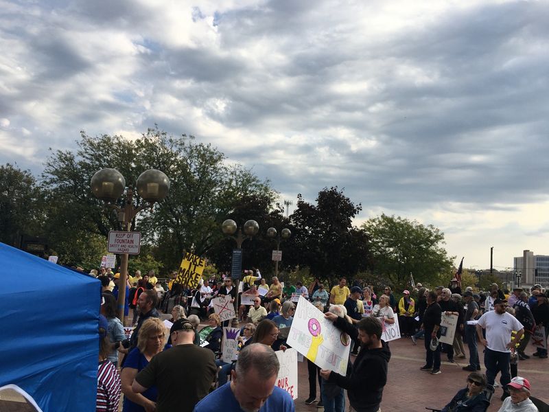 Crowds gather on Jon Hunt Plaza in downtown South Bend about 11:45 a.m. Saturday, Oct. 18 preparing for the "No Kings 2" protest against policies and actions of President Donald Trump. By noon, about 1,000 to 2,000 people were present.