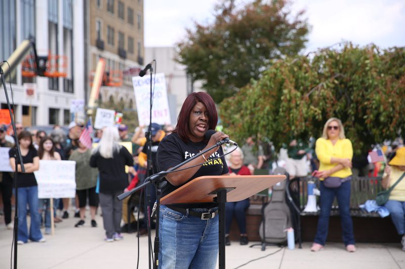 South Bend NAACP President Trina Robinson addresses the crowd Oct. 18, 2025, at the "No Kings 2" protest at the Jon Hunt Plaza in front of the Morris Performing Arts Center in downtown South Bend.
