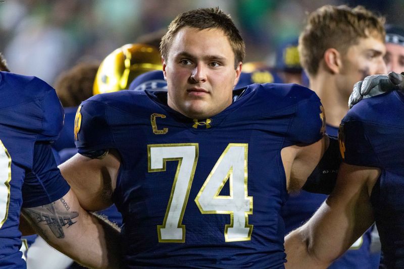 Sep 20, 2025; South Bend, Indiana, USA; Notre Dame Fighting Irish offensive lineman Billy Schrauth (74) sings the alma mater after beating the Purdue Boilermakers at Notre Dame Stadium. Mandatory Credit: Michael Caterina-Imagn Images