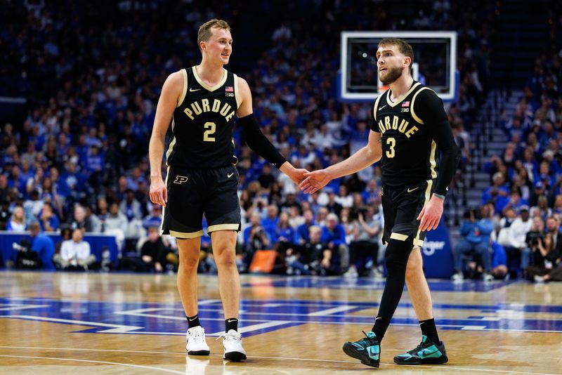 Oct 24, 2025; Lexington, KY, USA; Purdue Boilermakers guard Fletcher Loyer (2) fives guard Braden Smith (3) during the first half against the Kentucky Wildcats at Rupp Arena at Central Bank Center. Mandatory Credit: Jordan Prather-Imagn Images