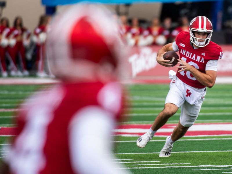 Indiana's Alberto Mendoza (16) runs during the Indiana versus UCLA football game at Memorial Stadium on Saturday, Oct. 25, 2025.