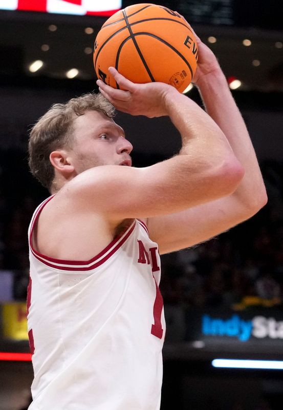 Indiana Hoosiers forward Tucker DeVries (12) shoots the ball against the Baylor Bears during an exhibition game Sunday, Oct. 26, 2025, at Gainbridge Fieldhouse in Indianapolis. Indiana defeated Baylor 76-74.